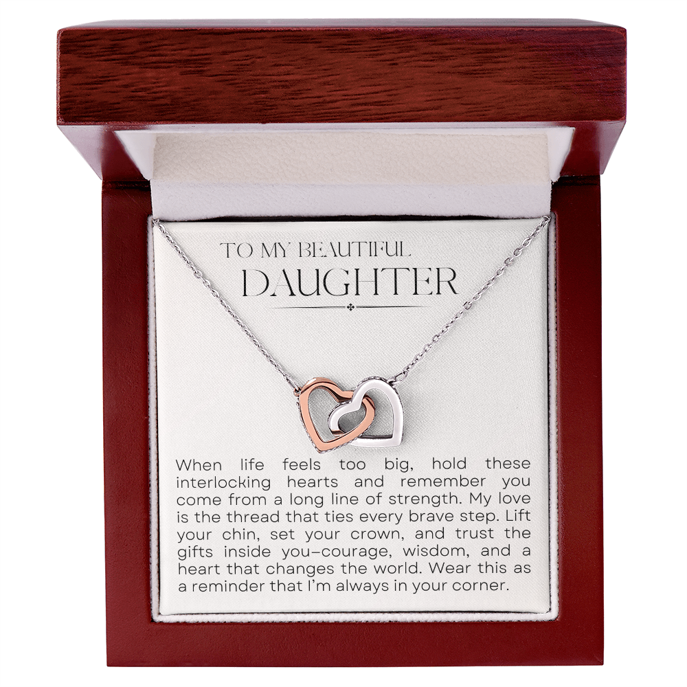 Interlocking Hearts necklace presented in gift box, lifestyle neutral